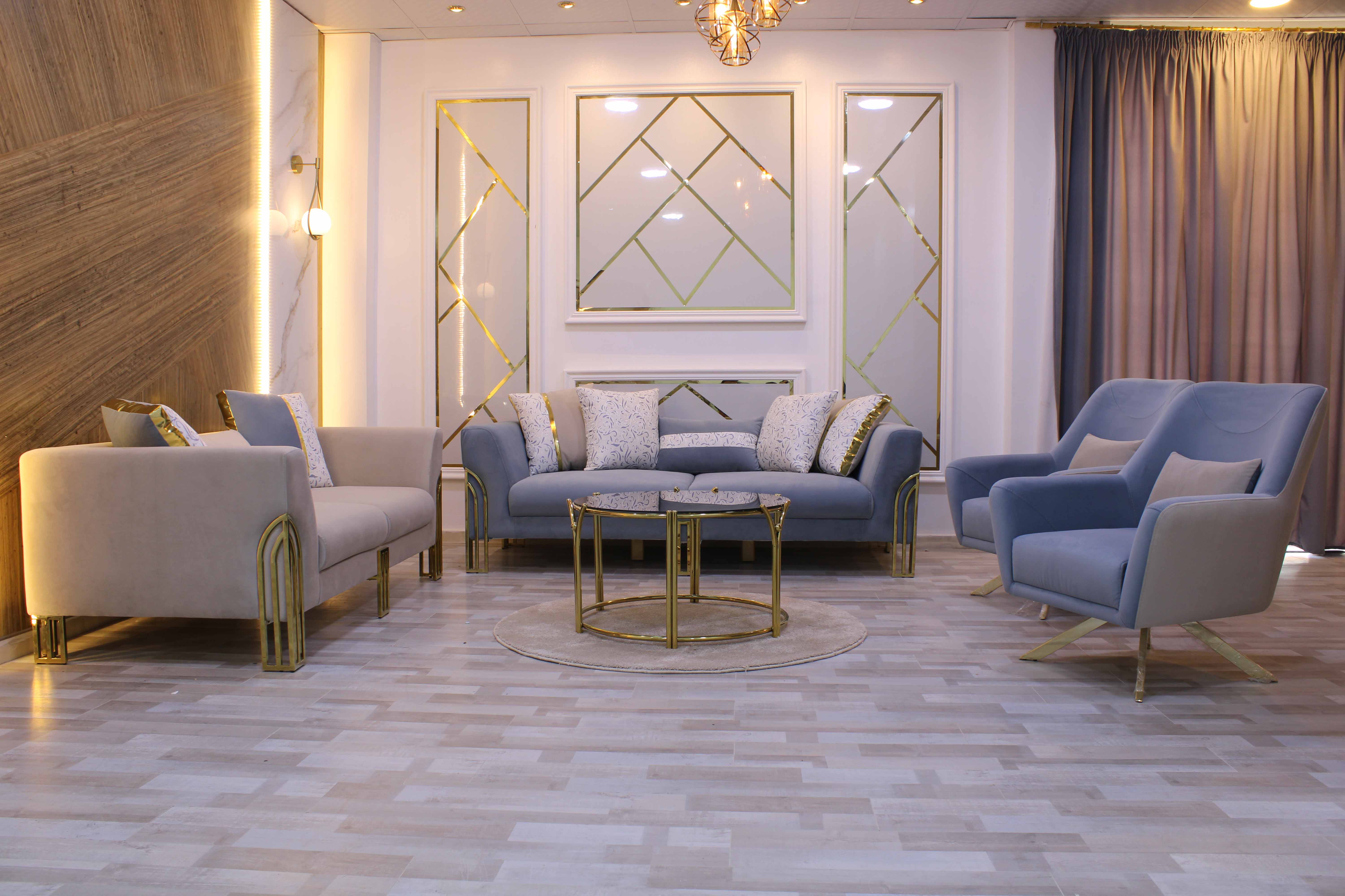 Babyblue, White, and Gold Cosmopolitan living room