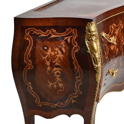 Bombe shaped Louis XV marquetry chest of drawer