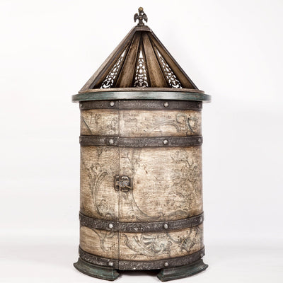 Cylindrical cabinet with rotating top front look